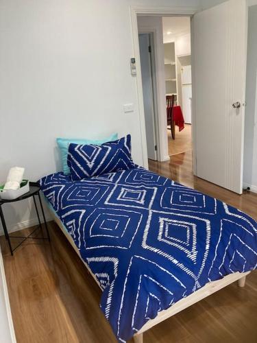 Letto o letti in una camera di Melton Cozy Home