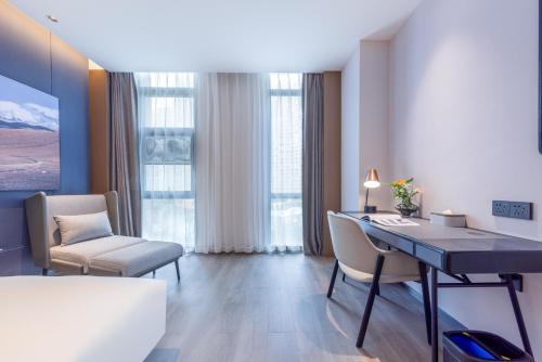 Ruang duduk di Atour Hotel Yuxi Nie'er Music Plaza