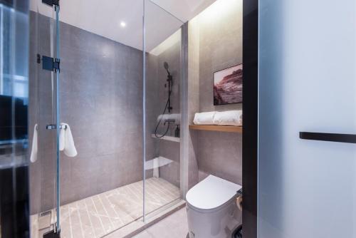 Bilik mandi di Atour Hotel Yuxi Nie'er Music Plaza