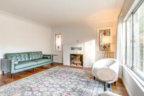 a living room with a couch and a fireplace at 12 Mi to Folsom Historic District NorCal Getaway in Fair Oaks