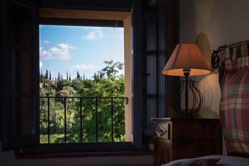 Postel nebo postele na pokoji v ubytování Il Borghetto Tuscan Holidays