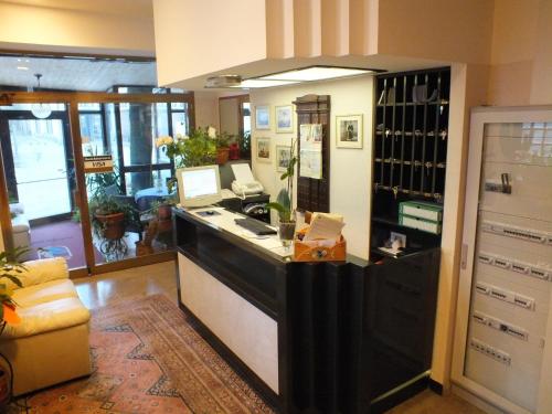 Η κουζίνα ή μικρή κουζίνα στο Piccolo Hotel