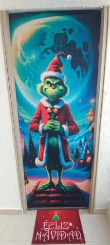 a picture of a santa claus in a picture frame at Apartamento en Ricaurte para descansar y disfrutar in Ricaurte