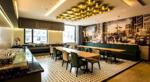 Photo de la galerie de l'établissement City Comfort Premier Hotel Xiong County Baiyangdian High-speed Railway Station, à Baoding