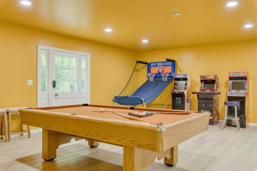 a room with a pool table and a slide at Game Farm Villa by AvantStay 10BDR Private Pond Spa Pool Family-Friendly in Catskill