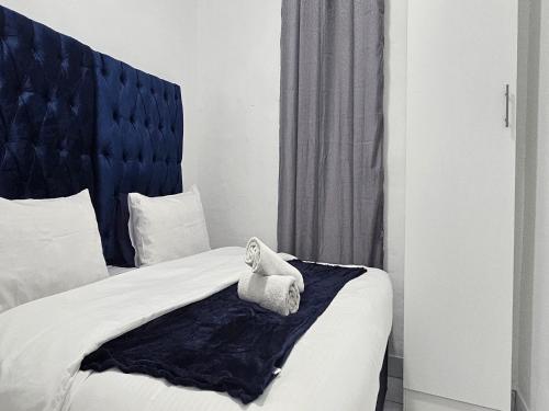 Ένα ή περισσότερα κρεβάτια σε δωμάτιο στο Goshen Lodge Fitzroy