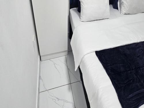 Ένα ή περισσότερα κρεβάτια σε δωμάτιο στο Goshen Lodge Fitzroy