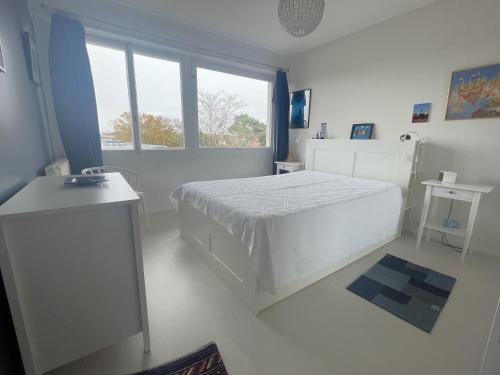 T2 Confortable avec Balcon, Parking et Équipements, Centre Arcachon, Proche Plage et Casino