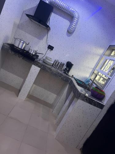 A kitchen or kitchenette at Ephpatha Apartment