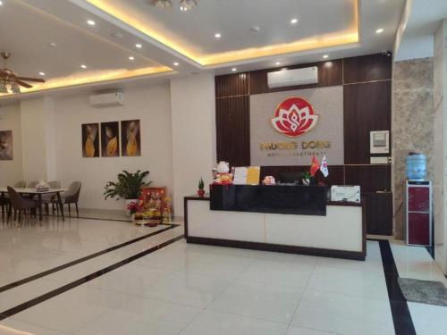 a lobby of a maruti love store with a table at Phương Đông Hotel and Apartment in Hai Phong