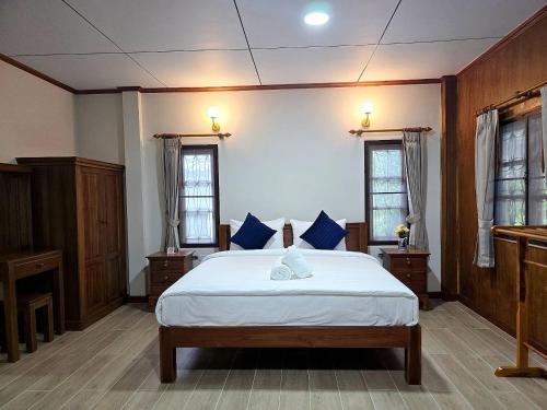 Postel nebo postele na pokoji v ubytování Mira Mare Resort Koh Samui