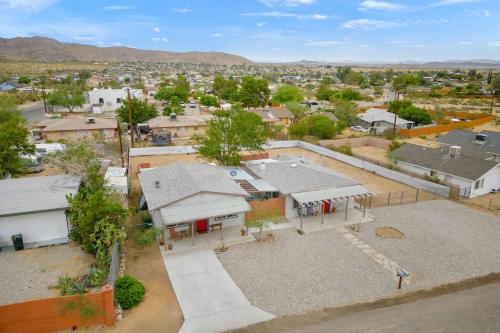 an aerial view of a small town with buildings at Fable by AvantStay 2 Unique Spaces w Bowling Hot Tub Fire Pit Large Yard in Joshua Tree