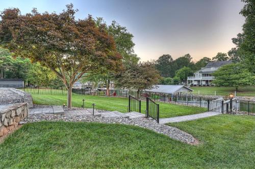 a park with a fence and a tree at Sip Sip Away by AvantStay Pool Hot Tub in Westport