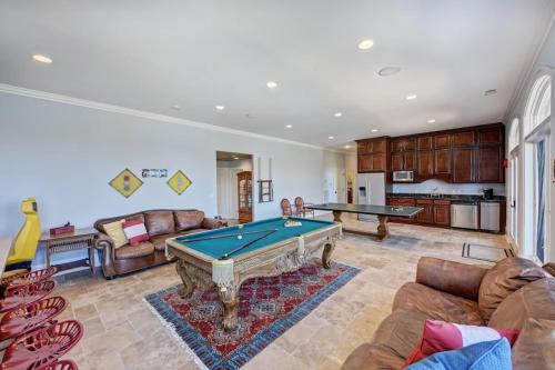 a living room with a pool table in it at Flip Flop Therapy by AvantStay Lakefront Home w Game Room Dock Access in Mooresville