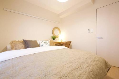 Cama o camas de una habitación en Li Kotohogi 202