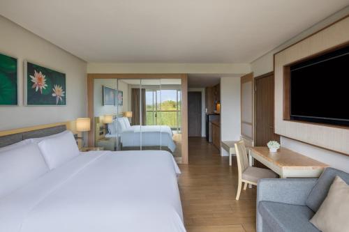 Cama o camas de una habitación en Dusit Thani Mactan Cebu Resort