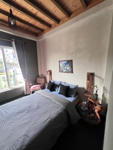 Postel nebo postele na pokoji v ubytování Rustique House dbl