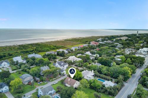 an aerial view of a houses and the beach at Ion by AvantStay Walk to Beach Dining Shopping Central Location Deck in Sullivans Island