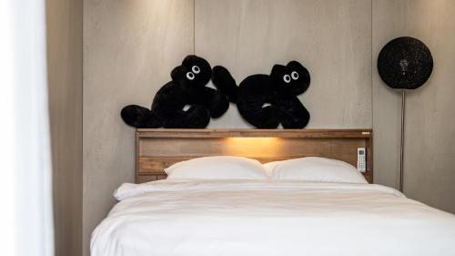 Postel nebo postele na pokoji v ubytování Goseong Gyeoulbada Ocean View Pension