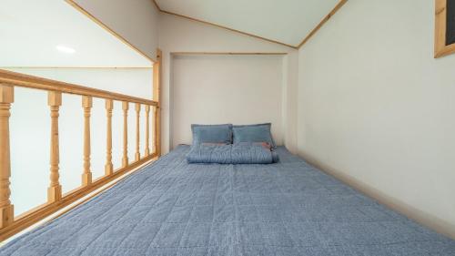 Postel nebo postele na pokoji v ubytování Gyeongju Jayeon Pension