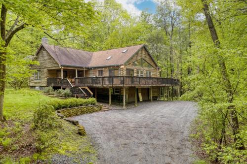 a large wooden house with a porch and a driveway at Half Moon by AvantStay 4BR Cabin w Large Deck Yard w Patio Outdoor Dining in Great Barrington