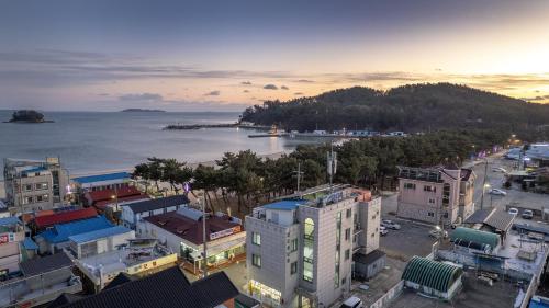 an aerial view of a city with the water at Taean yeonpo 2020 pension in Taean