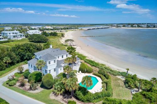 an aerial view of a house with a beach at Haven by AvantStay Luxury Beachfront Home w Pool Gorgeous Patios in Sullivans Island