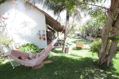 Un jardín fuera de Pousada Vale do Luar