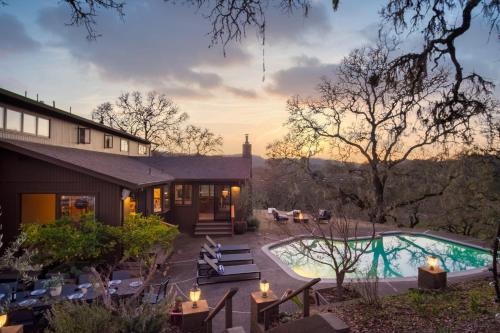 an exterior view of a house with a swimming pool at Gable by AvantStay Beautiful 3.5 Acre Oasis w Gorgeous Views Pool Hot Tub in Santa Rosa