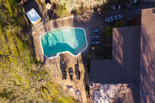 an overhead view of a swimming pool in a city at Gable by AvantStay Beautiful 3.5 Acre Oasis w Gorgeous Views Pool Hot Tub in Santa Rosa
