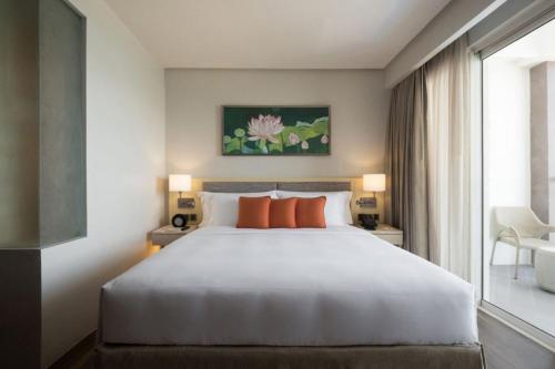 Cama o camas de una habitación en Dusit Thani Mactan Cebu Resort