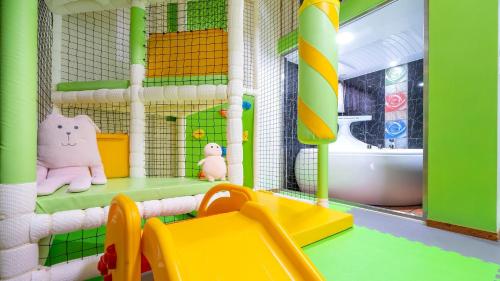 a childs play room with a play room with a play room at GaPyeong Lucerne kids Spa Pension in Gapyeong