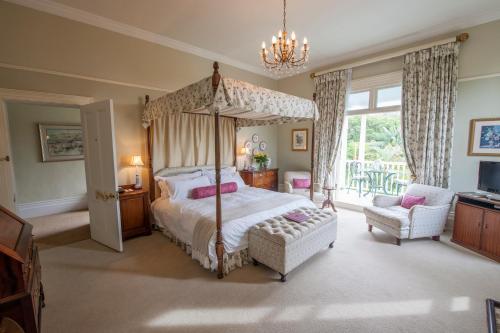 Letto o letti in una camera di Hacklewood Hill Country House