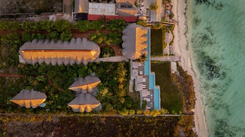 an overhead view of a building next to a beach at Bamboo Zanzibar in Jambiani