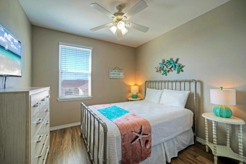 a bedroom with a bed and a ceiling fan at The Beautiful Place by AvantStay Mins to Beach Family-Friendly Pool in Padre Island