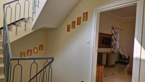 a staircase in a room with a stair case at Arti's Homestay in Agra