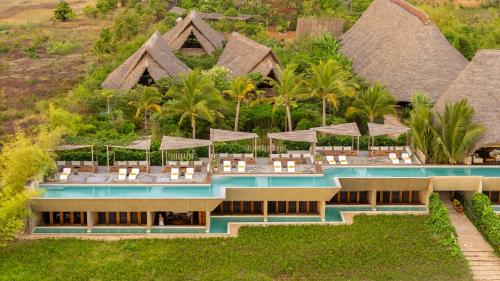 an aerial view of a resort with a swimming pool at Bamboo Zanzibar in Jambiani