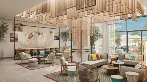a rendering of a lobby with chairs and tables at Rove Al Marjan Island in Ras al Khaimah