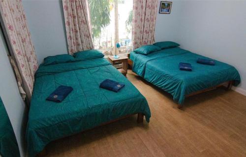 Cama o camas de una habitación en BanMoomJan Pool villa Khao Yai KP