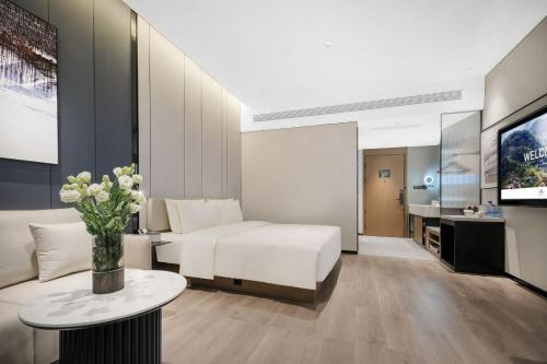 TV a/nebo společenská místnost v ubytování Atour Hotel Chengdu Jinhua Wanda Liulichang