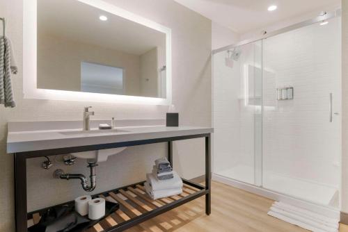a bathroom with a sink and a shower at Cambria Hotel El Centro - Imperial in El Centro