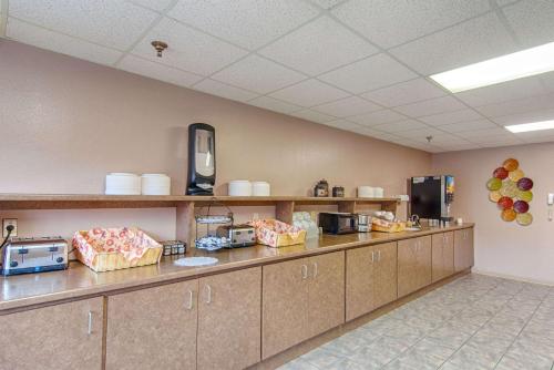a large room with a long line of counters and cabinets at Park Tower Inn in Pigeon Forge