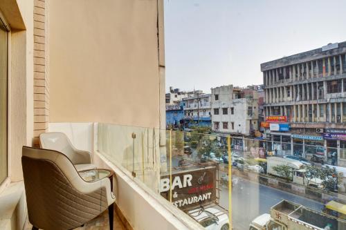 a balcony with a view of a city at Hotel The Pearl, City Center - Traveler's Choice Award Winner for 2025 in New Delhi