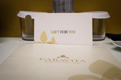 Certifikát, hodnocení, plakát nebo jiný dokument vystavený v ubytování Hotel Caravita