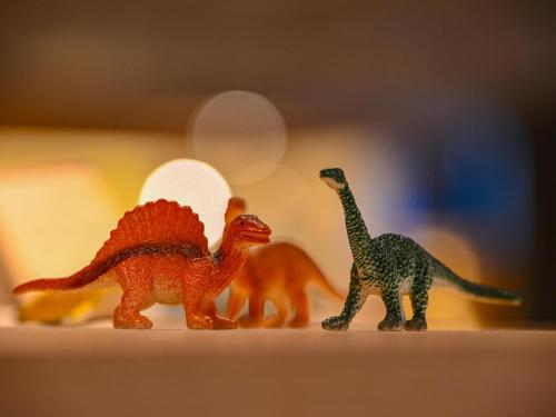 a group of toy dinosaurs standing next to each other at Hokuriku Fukui Awara Onsen Mimatsu in Awara
