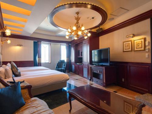 Una cama o camas en una habitación de Hotel Concerto Nagasaki