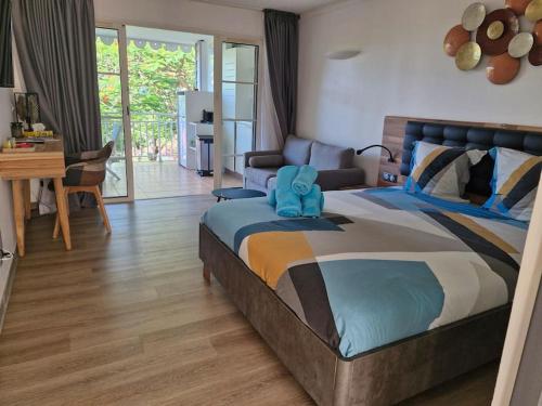 Postel nebo postele na pokoji v ubytování Magnifique appartement avec terrasse Coco Beach