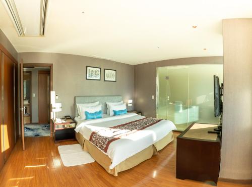 Katil atau katil-katil dalam bilik di The Blue Sky Hotel and Tower