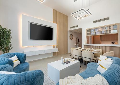 TV o dispositivi per l'intrattenimento presso Luxurious 2-bedroom Apartment in Downtown with Burj Khalifa View