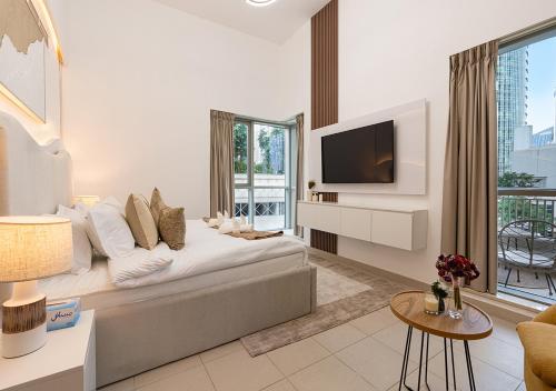 TV o dispositivi per l'intrattenimento presso Luxurious 2-bedroom Apartment in Downtown with Burj Khalifa View